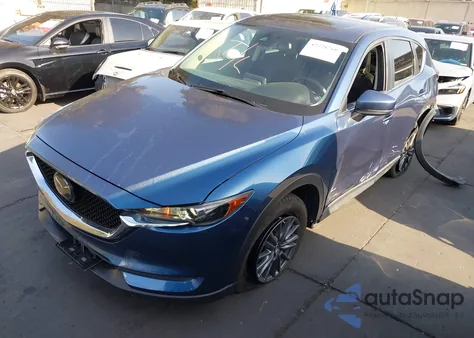 2020 Mazda Cx-5 Touring z USA, uszkodzony, nr VIN JM3KFACM4L1833432